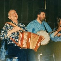 Martin McHugh, Sean O'Driscoll and Mary O'Driscoll at a céilí at St. Mark's