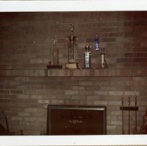 Chuck Russell's trophies on a mantle