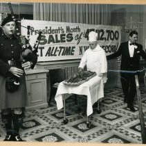 Brian Boru Irish Pipe Band member Charles Russells "pipes in" a dinner cour