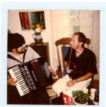 Mark Stillman and Jamie Gans at a house party