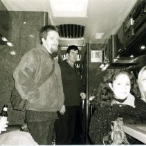 Nick Lethert, Liz Welch and Mairéad Ní Mhaonaigh on the Altan tour bus