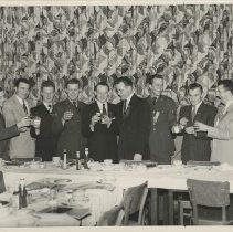 Servicemen toast at a Twin City Irish American Club dinner