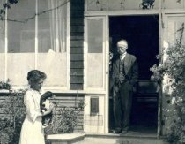 Thaddeus & Ludmilla Welch outside home, East Sola St.