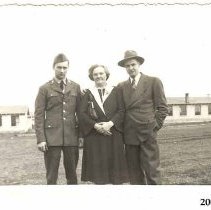 Fort Lewis, 1941, Duke and Ches McCurry with mother, Alcia Baxter
L-r:  Duke (Julius) McCurry, Alcia Baxter (Duke's mother, remarried), Ches McCurry (Duke's brother)