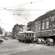 TER Passenger Motor 307 on Travis Street, Sherman