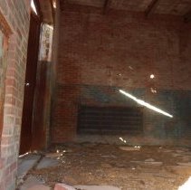 Lawrence Substation Interior View Towards a Wall and Side Door