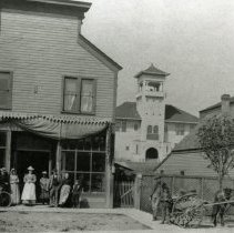 Hepler Grocery with Hepler family in front. Columbia School in background