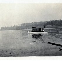 Matthiesen Launch on Lake Washington, man in canoe
