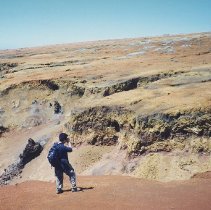 Man photographing landscape