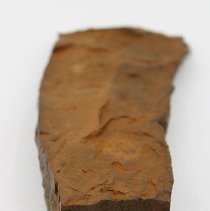 Lengthwise view of polished fragment