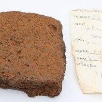 Lava abrader with artifact slip