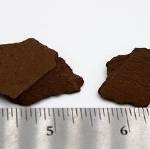 Two polished adze flakes