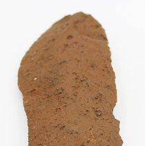 Lengthwise view of rough side of basalt knife