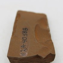 Lengthwise view of an adze fragment with alternate id number visible