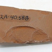 Basalt adze fragment with alternate id number visible