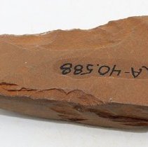 Basalt adze fragment with alternate id number visible