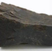 Profile of basalt adze fragment