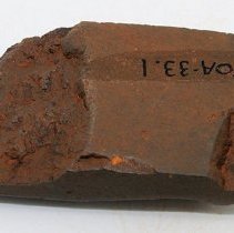 Adze fragment with alternate id number visible