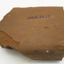 Basalt adze fragment with alternate id number visible