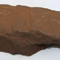 Profile of a basalt adze fragment