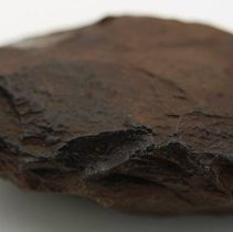 Closeup profile of a basalt adze blank