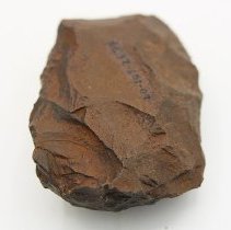 Close up of basalt adze blank with visible alternate id number