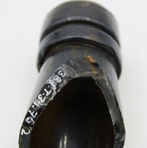 Glass bottle fragment with ruler