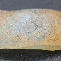 Closeup of glass bottle fragment