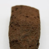 Lengthwise view of an adze preform