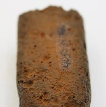 Lengthwise view of an adze preform with alternate id number visible