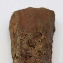 Closeup lengthwise view of adze blank