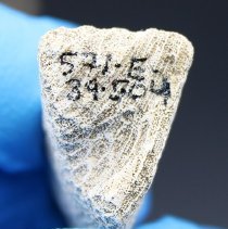 Coral abrader with visible alternate id number