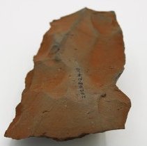 Lengthwise view of adze blank with visible alternate id number