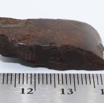 Close up of small basalt adze