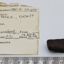 Small adze with artifact slip and ruler
