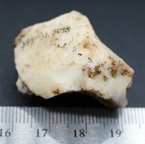 Quartzite core with visible alternate id number and ruler