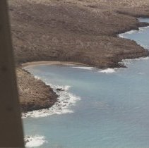 Aerial view of Ki'i through helicopter window