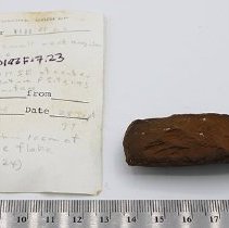 Adze with artifact slip and ruler