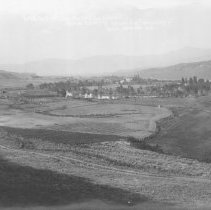 LOOKING UP OKANOGAN VALLEY.  BACKGROUND SHOWING OKANOGAN   FRANK MATSURA FOTO   1911