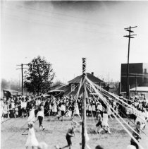 Scene of a May Pole Dance