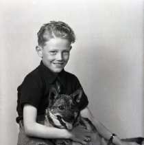 C. L. Hansen and his dog.