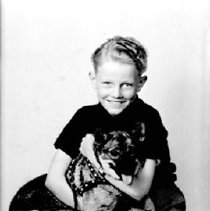 C. L. Hanson & his dog.