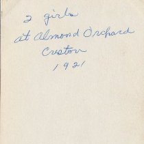 2 girls at Almond Orchard. Creston 1921