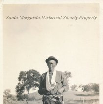 Bill Epperly in his WWI  uniform with his arm in a sling.