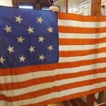 Bicentennial 14 Star Flag that flew over the Fire Station