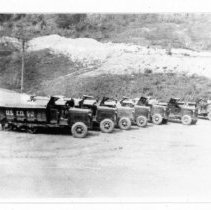 Half tracks hauling fill.