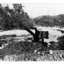 Dragline excavation of dam site.