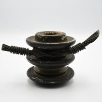 Metal Fixture, with barbed wire attached