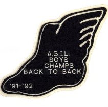 Patch. Black and white, shoe shaped with wing, A.S.I.L. Boys Champs Back to Back. 91-92
