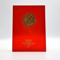 USDESEA Class B Track and Field Champions 1974. Red with Gold emblem